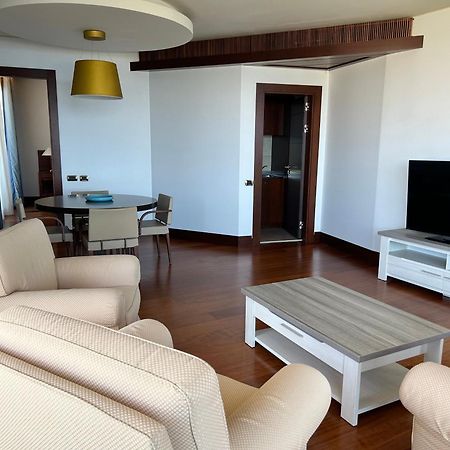 Smy Carlos V Wellness & Spa Alghero Exterior photo A living room in a modern apartment