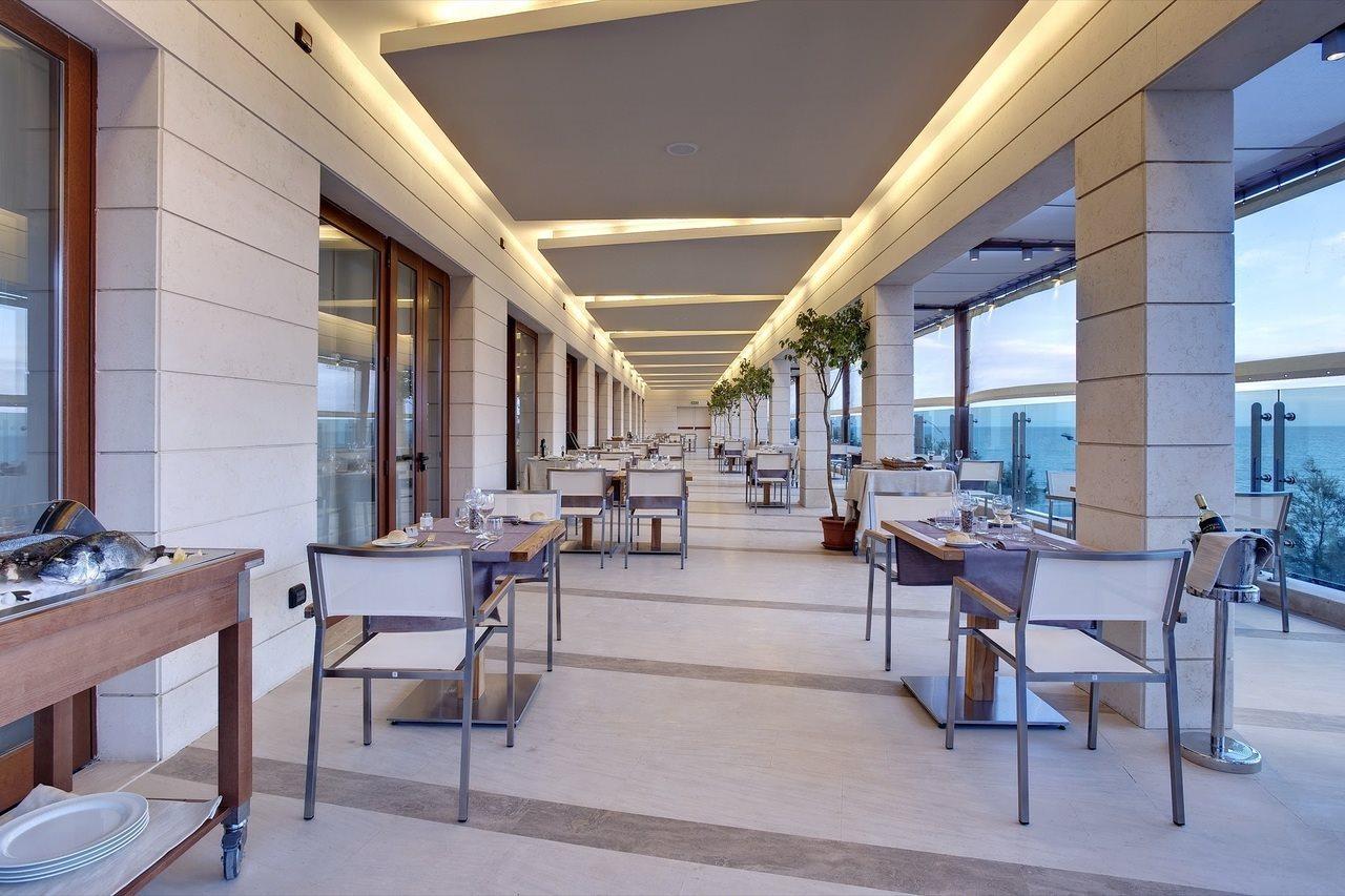 Smy Carlos V Wellness & Spa Alghero Exterior photo The restaurant