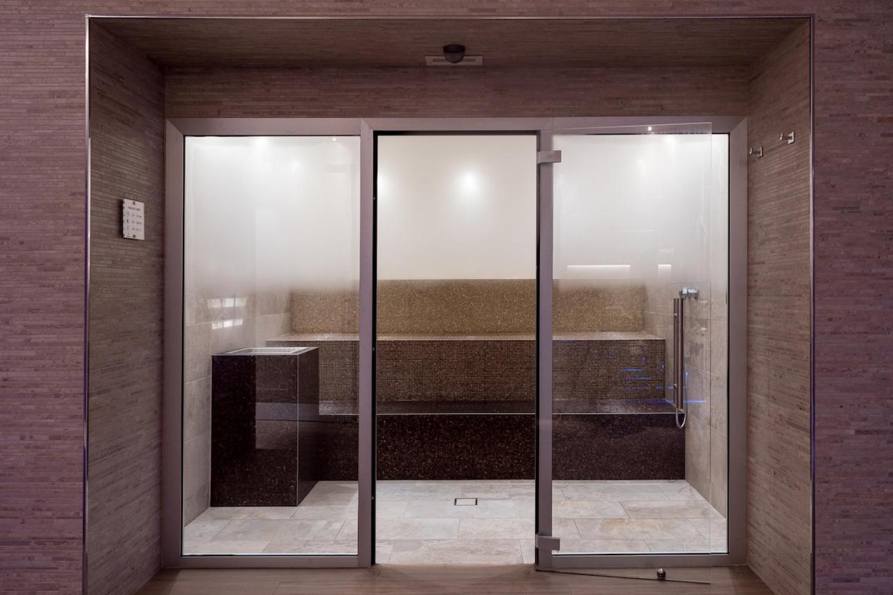 Smy Carlos V Wellness & Spa Alghero Exterior photo A modern Japanese onsen