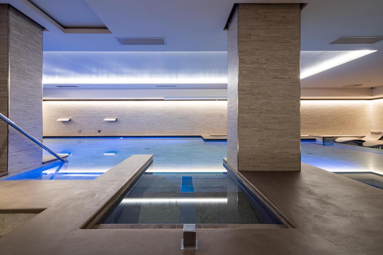 Smy Carlos V Wellness & Spa Alghero Exterior photo The swimming pool at The Dorchester
