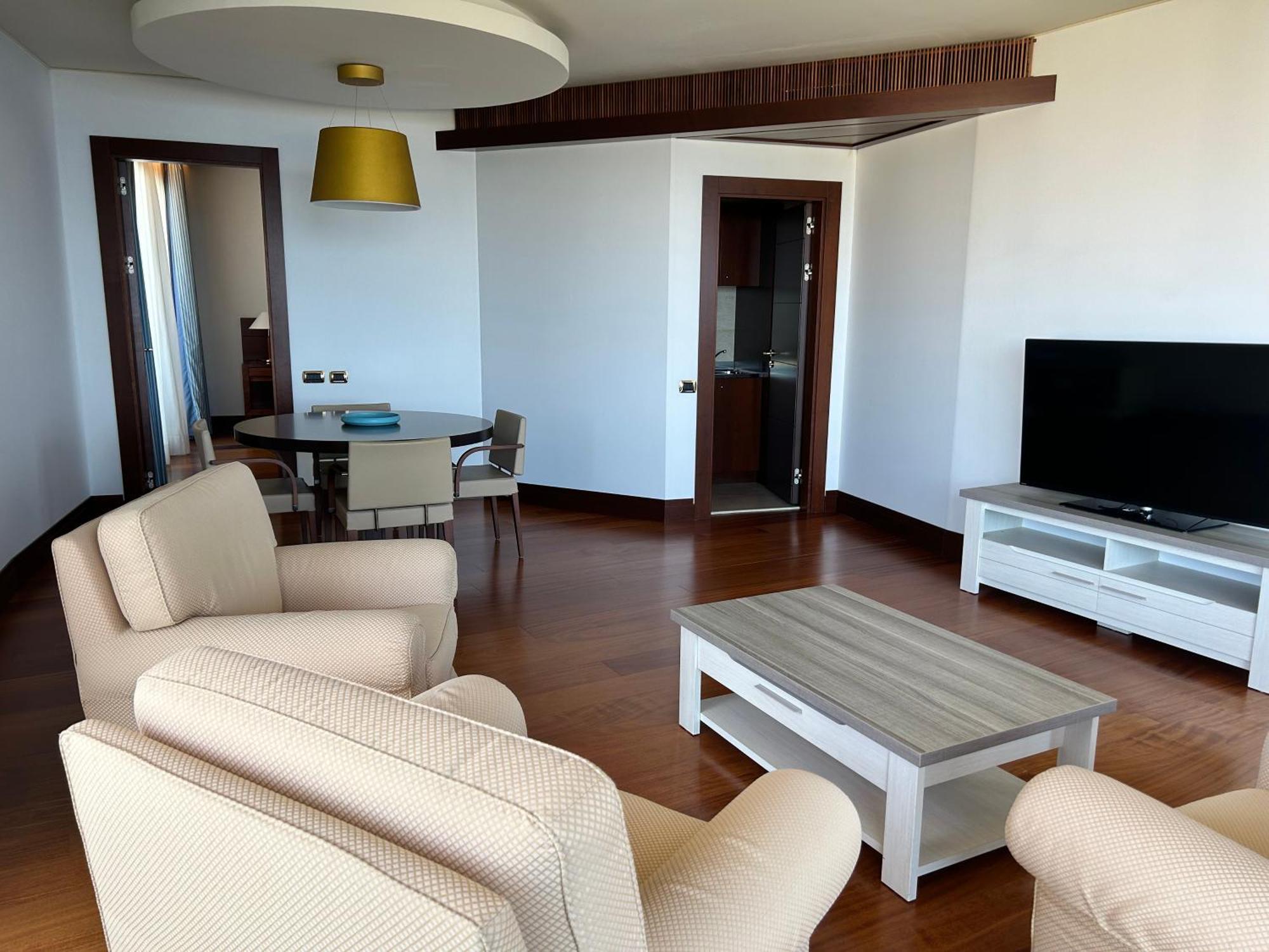 Smy Carlos V Wellness & Spa Alghero Exterior photo A living room in a modern apartment